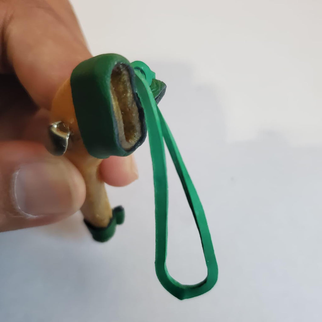Short scabbard, rawhide, rubber band fastener  Mexican short scabbard, rawhide with rubber band fastener.